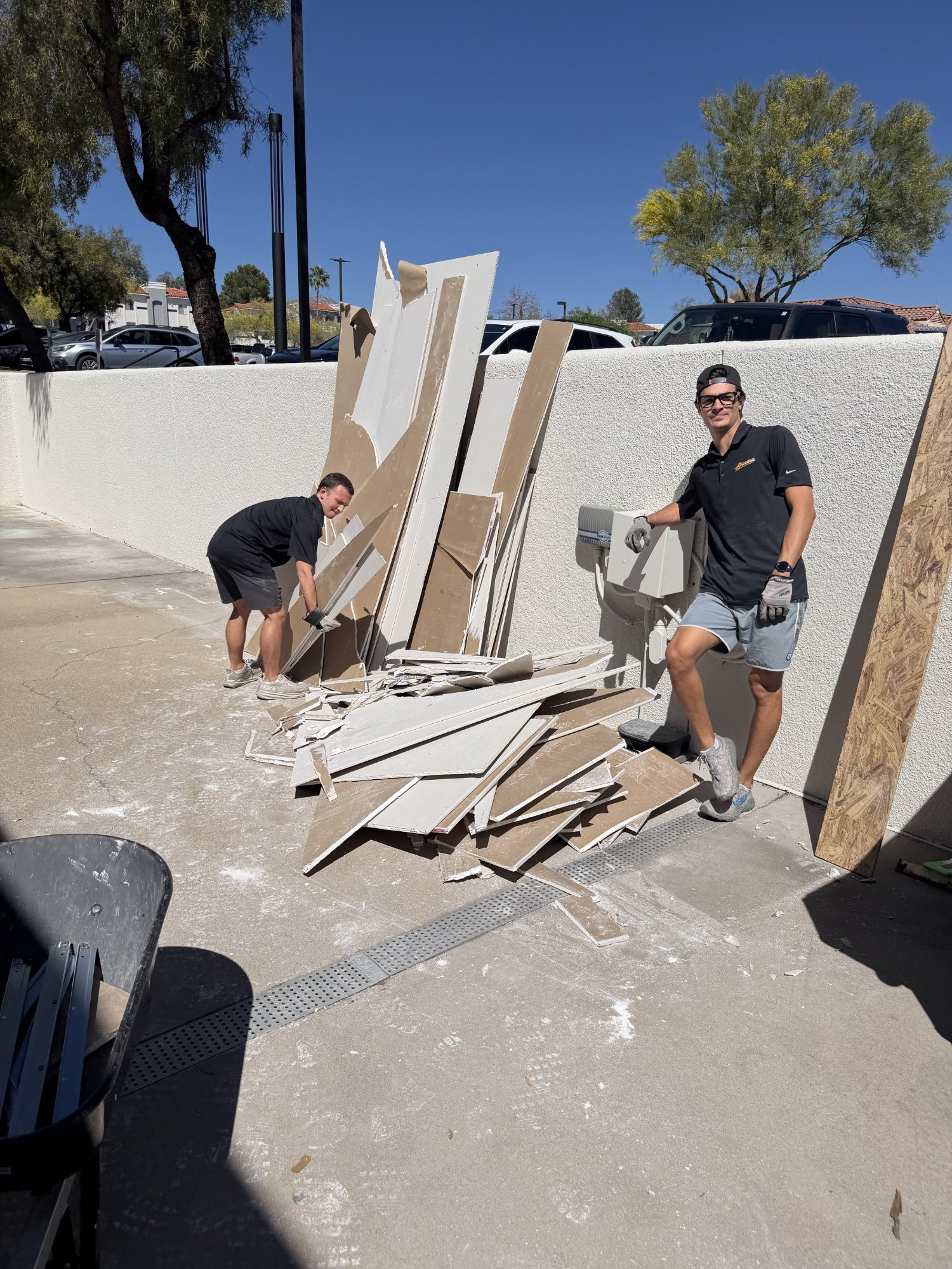 Haul Heroes property cleanout team loading furniture in Tucson Arizona