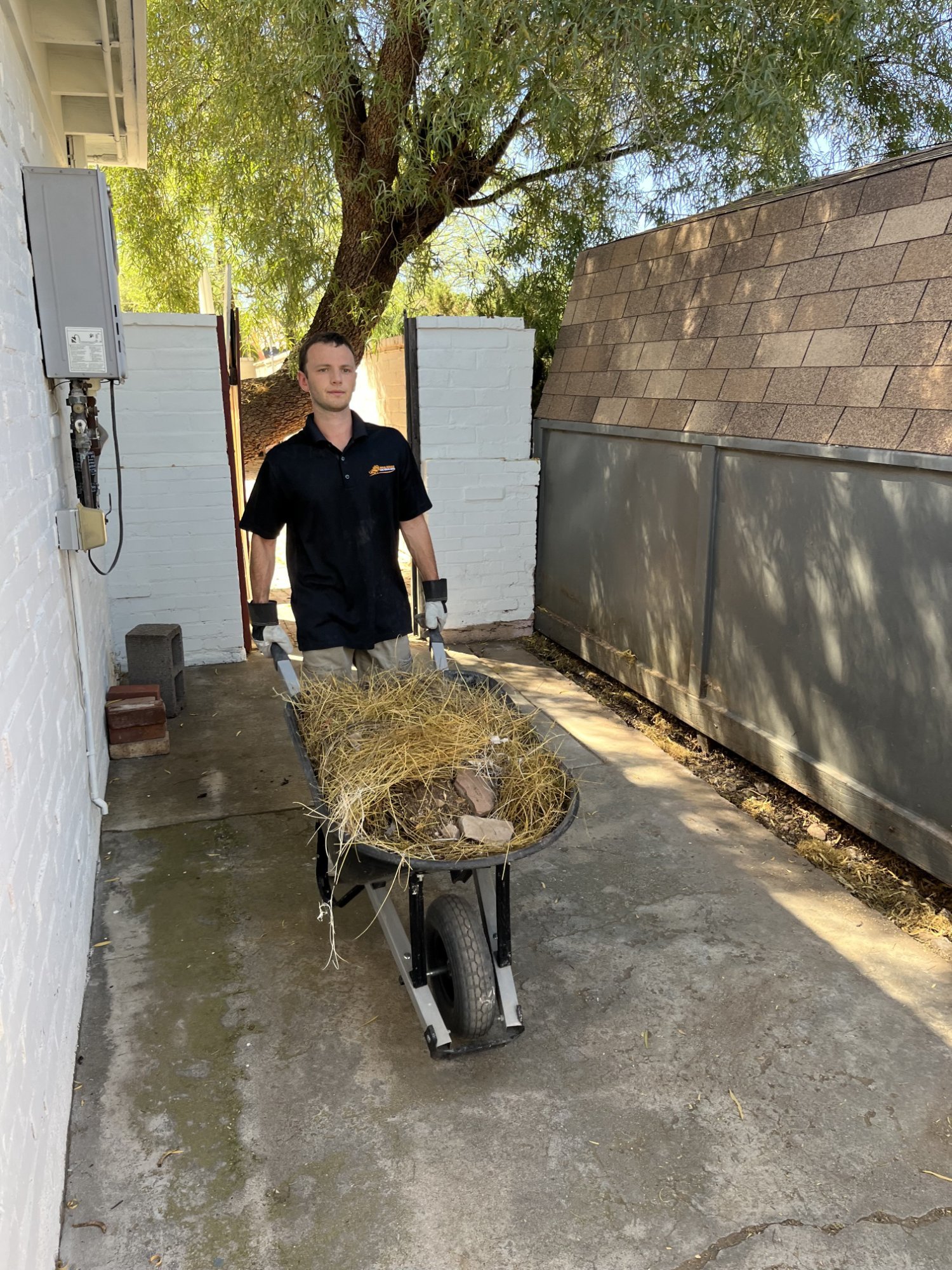 Haul Heroes junk removal crew hauling furniture and appliances in Tucson AZ